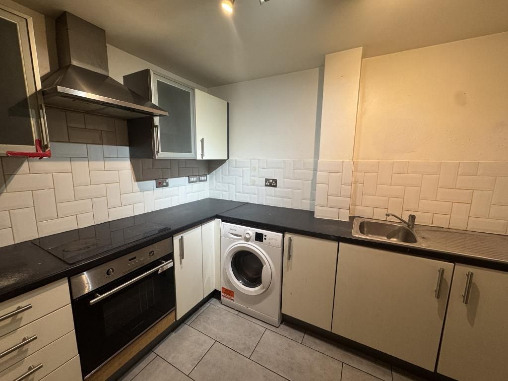 Property photo 3 of 7 Kitchen