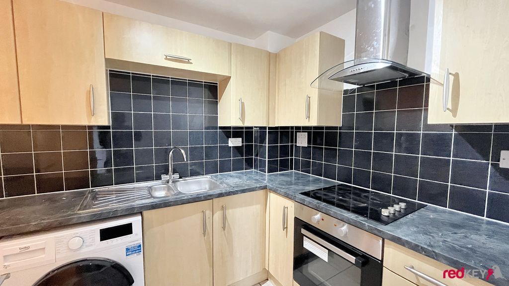 Property photo 3 of 7 Kitchen