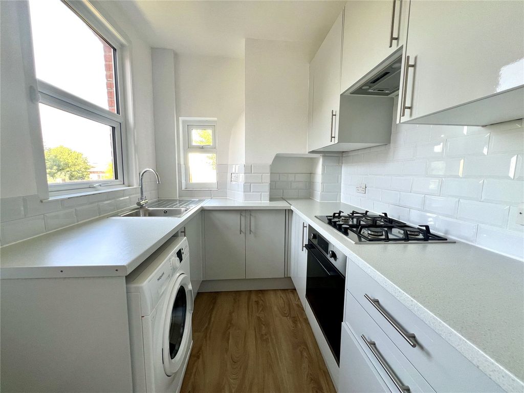 Property photo 3 of 12 Kitchen