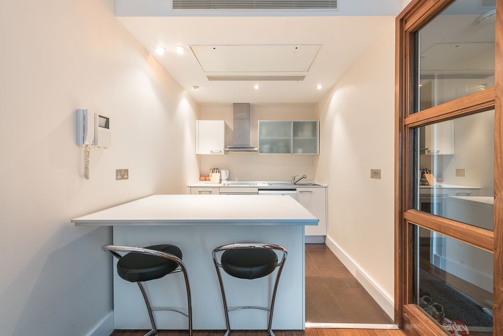 Property photo 3 of 8 Kitchen