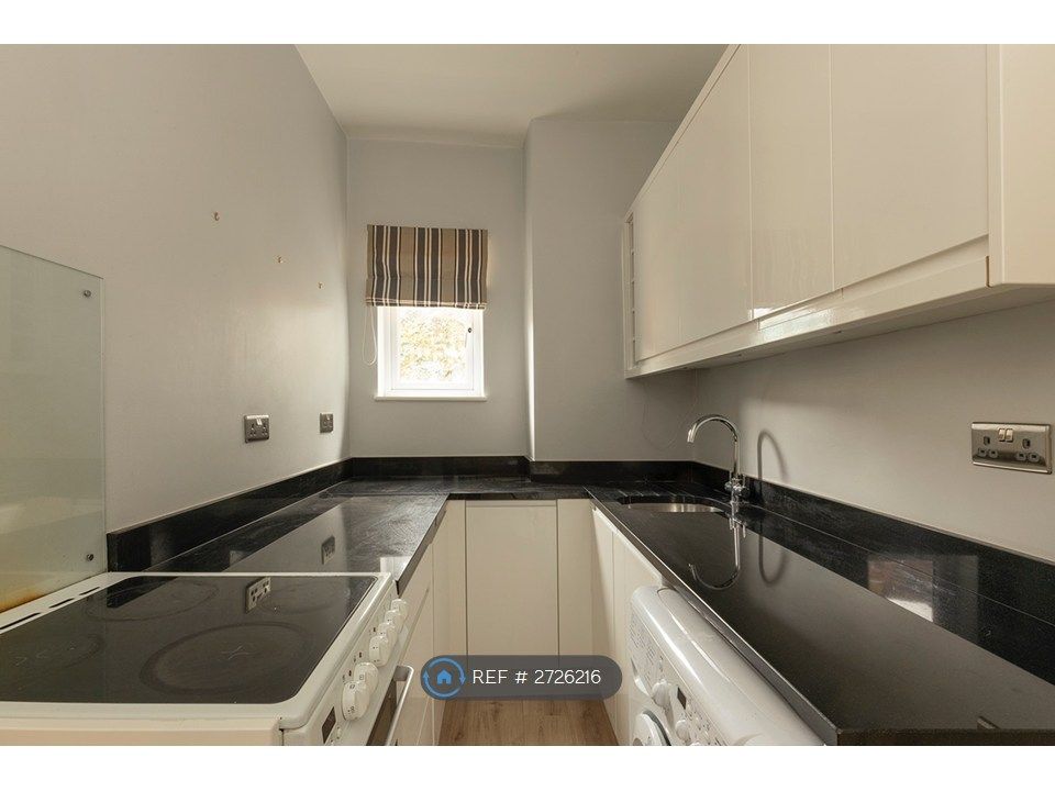 Property photo 3 of 7 Kitchen