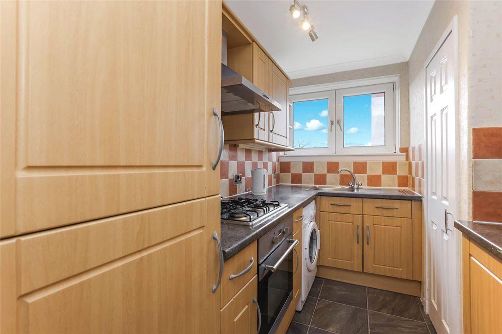 Property photo 3 of 13 Kitchen