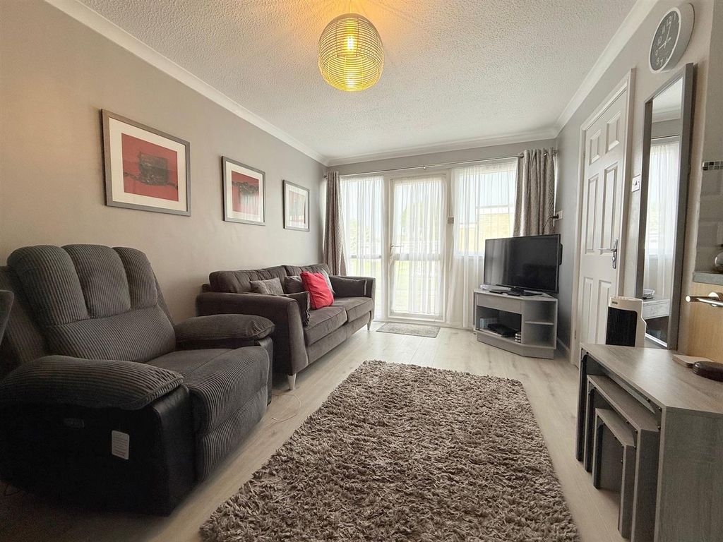 Property photo 3 of 10 Living Room Area