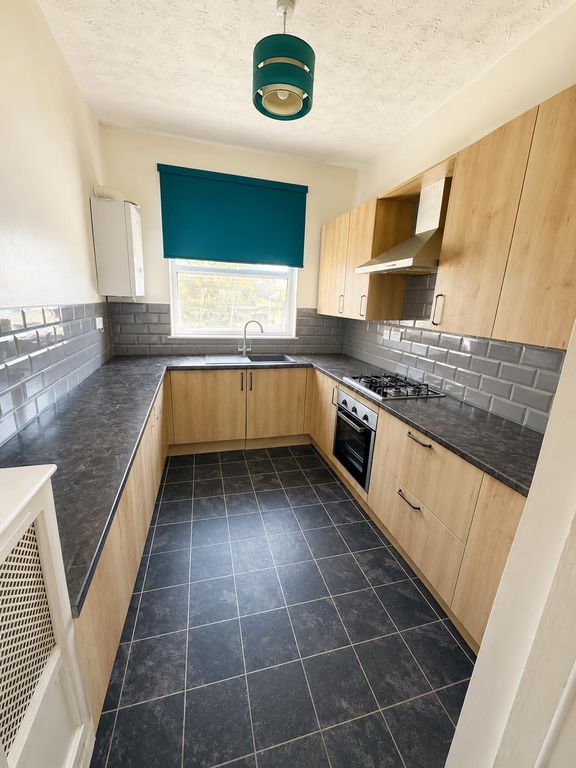 Property photo 2 of 8 Kitchen