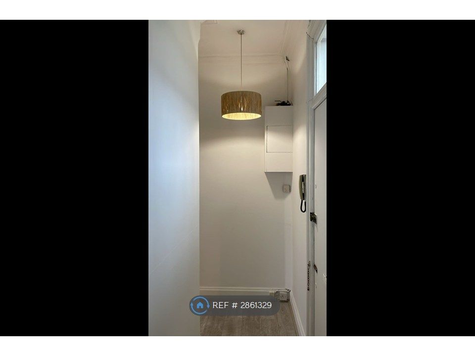 Property photo 3 of 12 Hallway And Secured Entry