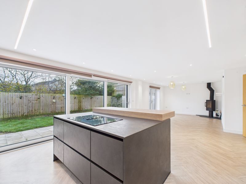 Property photo 3 of 17 Kitchen/Dining/Living Area