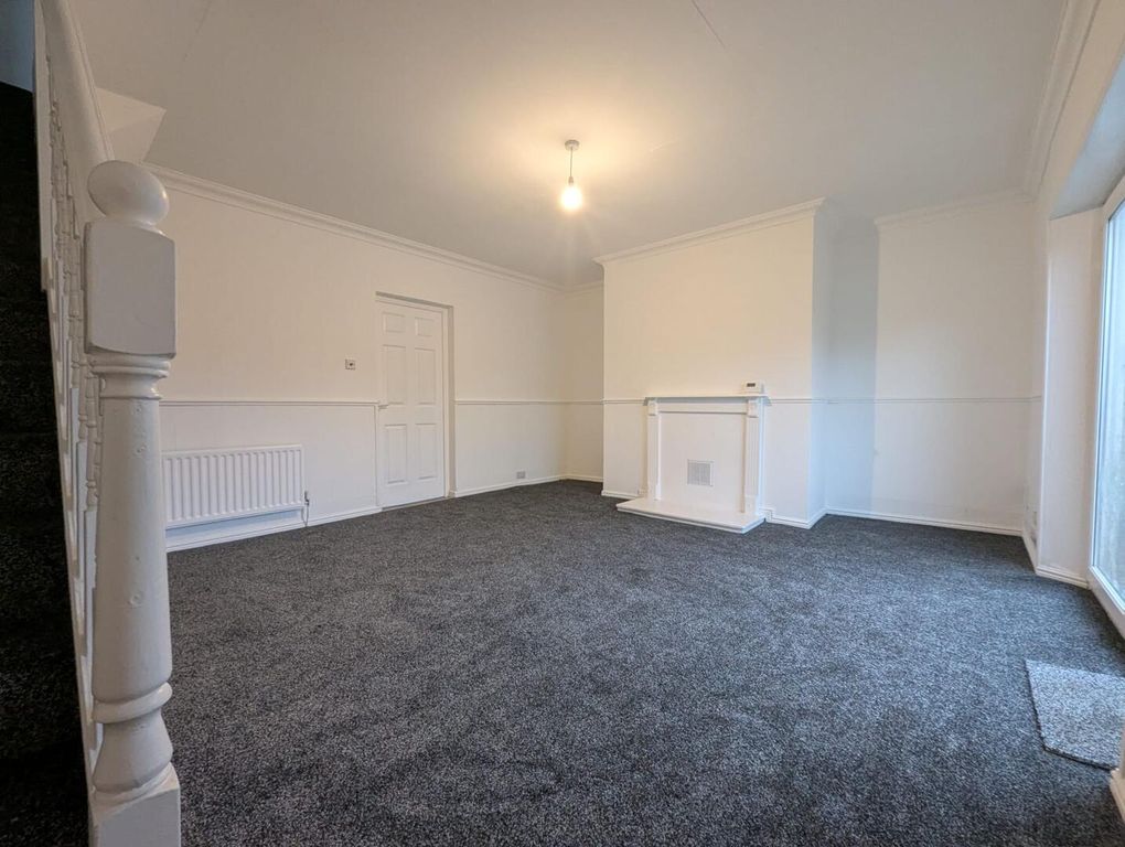 Property photo 3 of 8 Living Room
