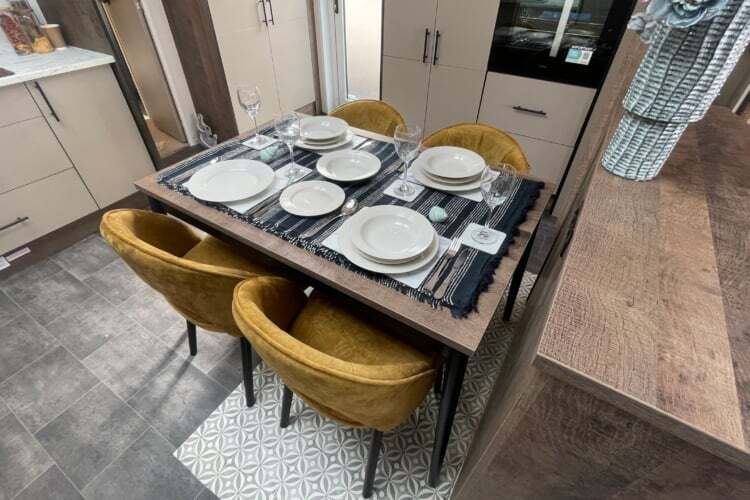 Property photo 3 of 10 A Dining Table Set For Four People In A Modern Caravan Or Lodge Interior With Brown And Beige Tones