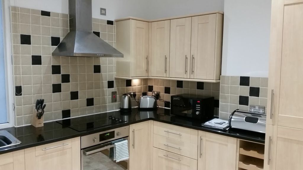 Property photo 3 of 6 Kitchen