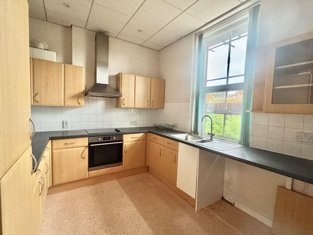 Property photo 3 of 7 Kitchen