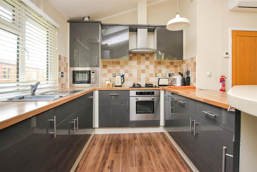 Property photo 3 of 20 Kitchen/Dining/Living Room