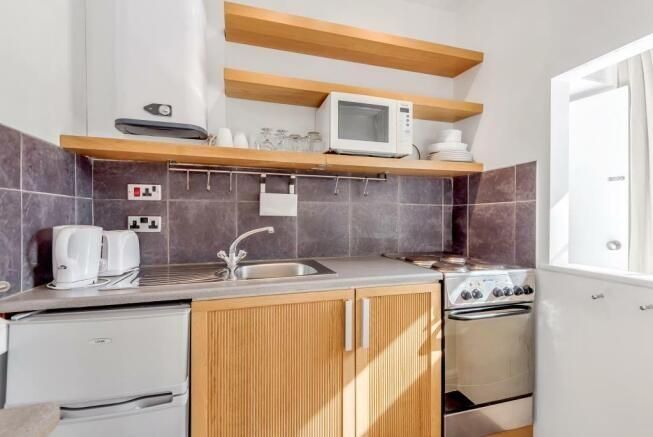 Property photo 2 of 7 Kitchen