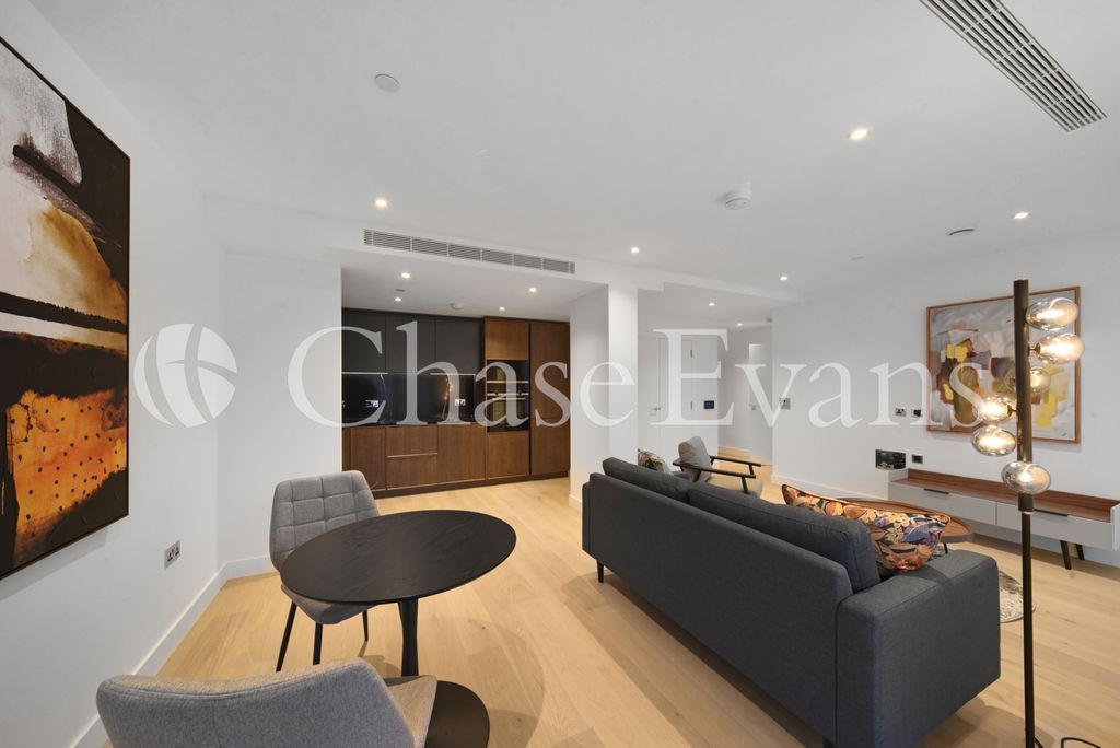 Property photo 3 of 10 Living Area - Opus H