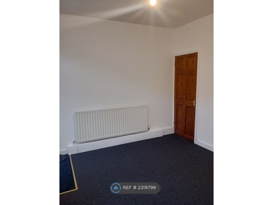 Property photo 2 of 10 Front Living Room