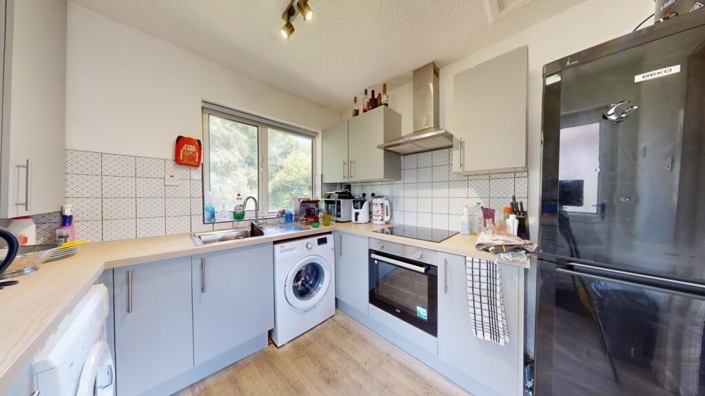 Property photo 3 of 8 Bright And Modern Kitchen With Ample Counter Space...