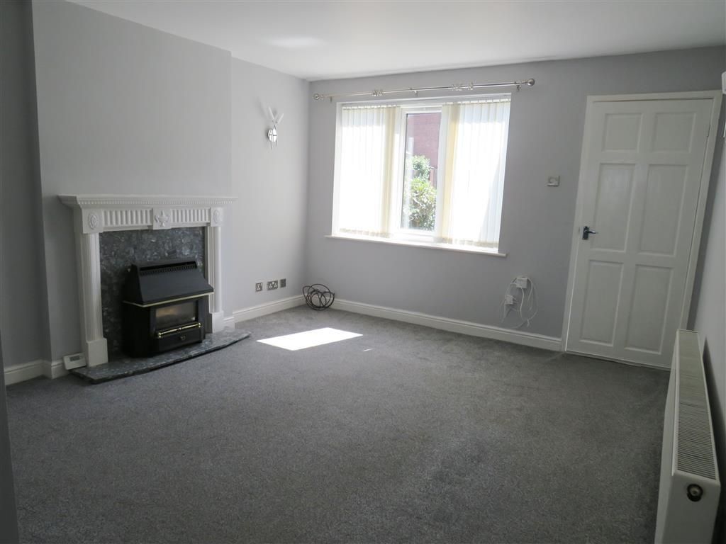 Property photo 2 of 8 Living Room