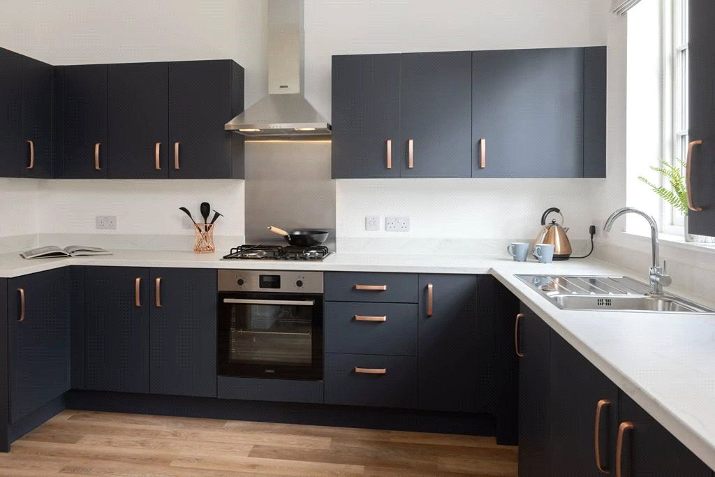 Property photo 3 of 7 Typical Kitchen