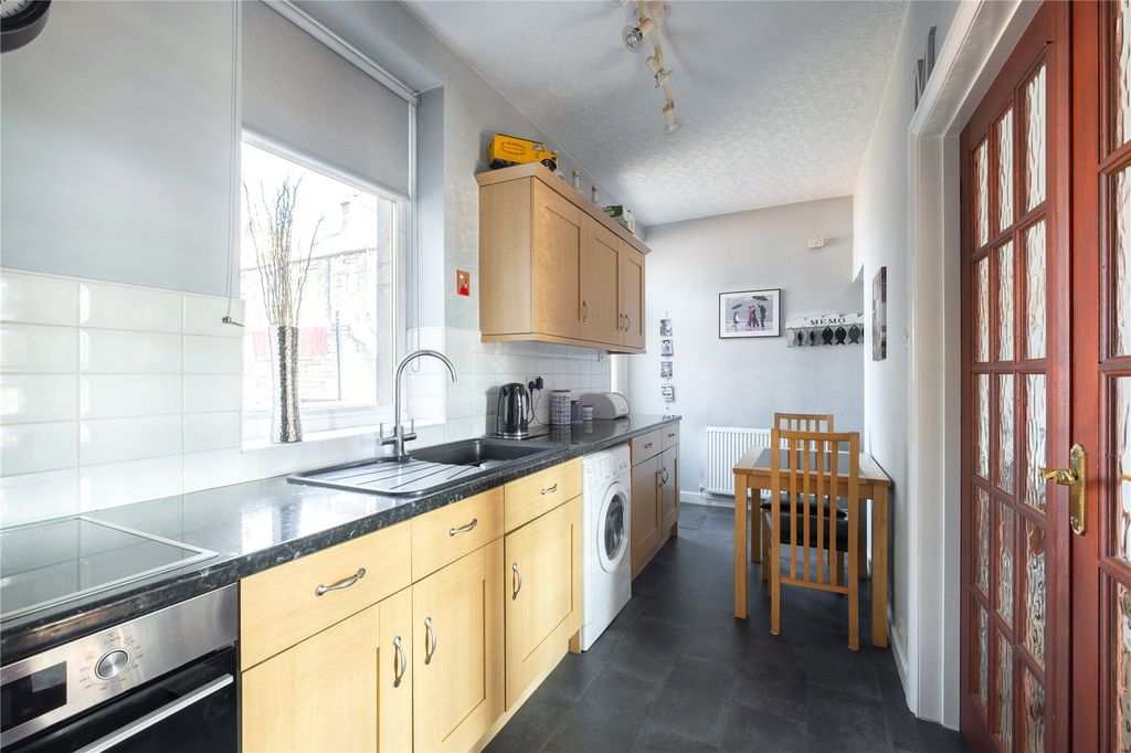 Property photo 3 of 16 Kitchen