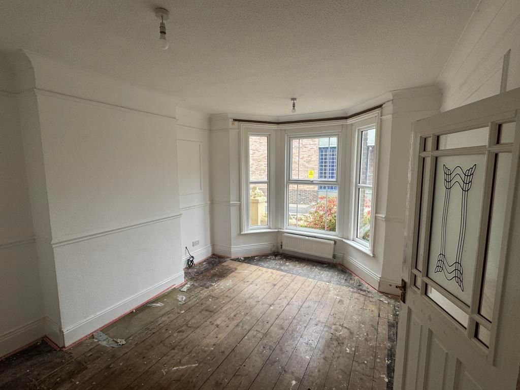 Property photo 3 of 10 Living Room With Bare Floors And White Walls
