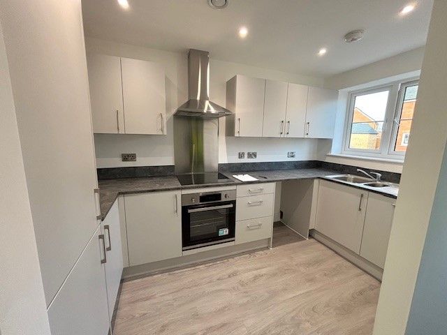 Property photo 3 of 8 Kitchen