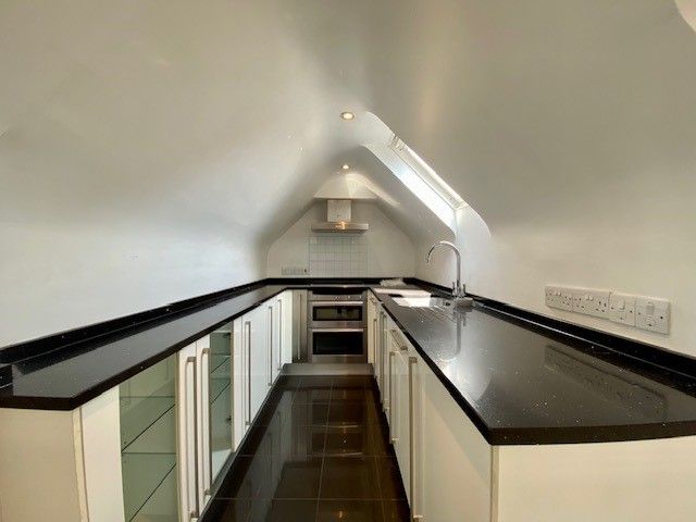 Property photo 3 of 8 Kitchen