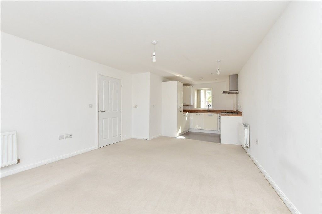 Property photo 2 of 9 Kitchen/Living Area