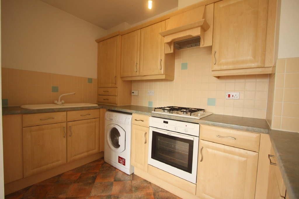 Property photo 3 of 7 Kitchen Area