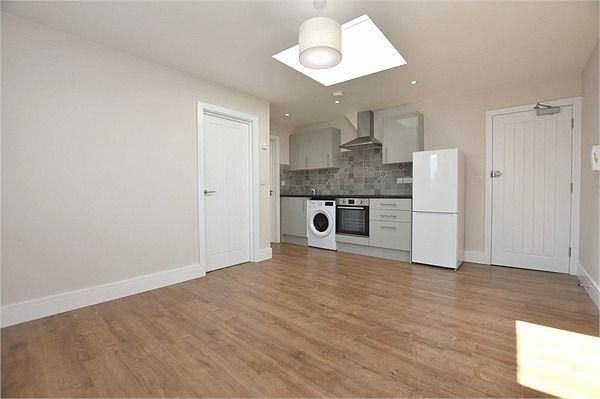 Property photo 3 of 6 Kitchen & Living Area