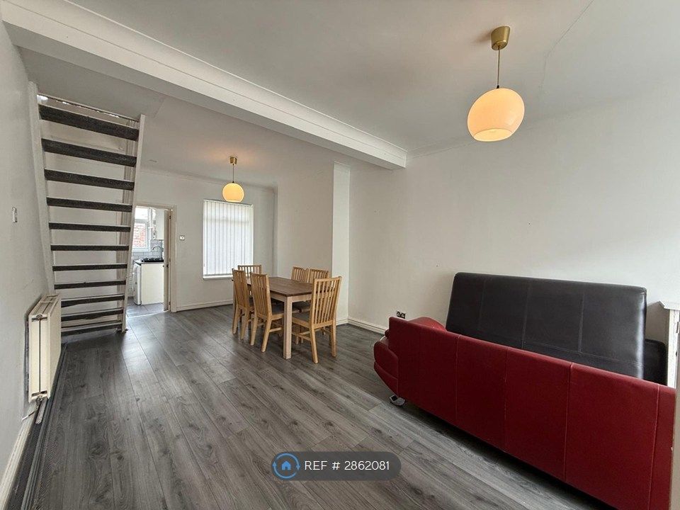 Property photo 2 of 13 Living Area