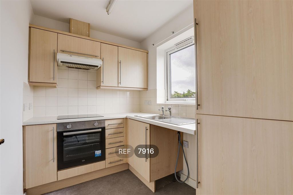 Property photo 2 of 12 Kitchen