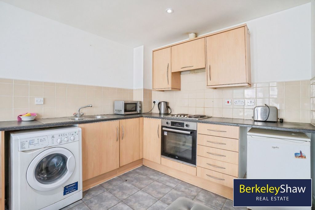 Property photo 2 of 10 Kitchen Area