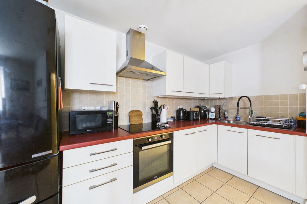 Property photo 3 of 10 Kitchen Area