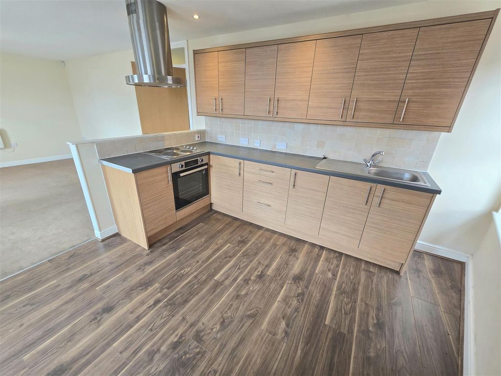 Property photo 1 of 7 Kitchen Area