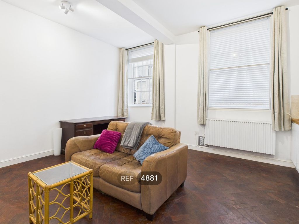 Property photo 2 of 11 Kitchen/Living Area