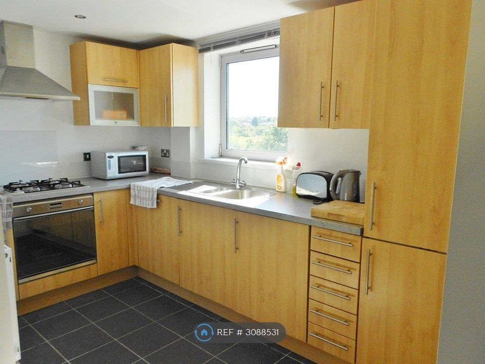 Property photo 3 of 8 Kitchen