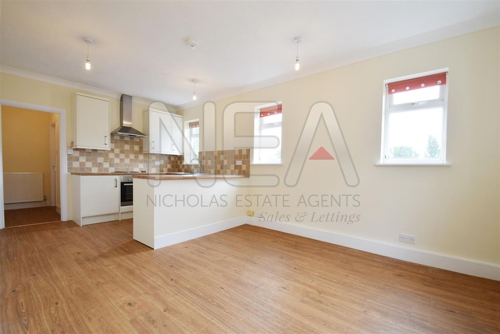 Property photo 3 of 12 Kitchen And Living Room
