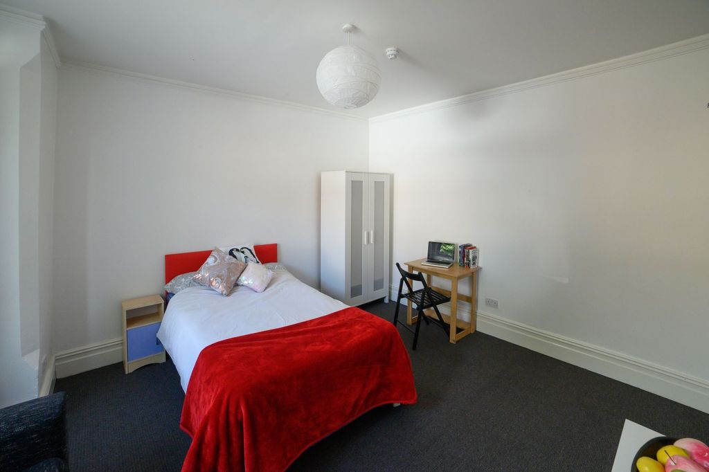Property photo 2 of 11 A Bright And Welcoming Bedroom Featuring A Comfort...