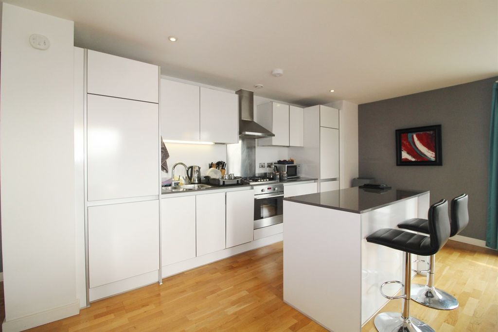 Property photo 3 of 8 Kitchen
