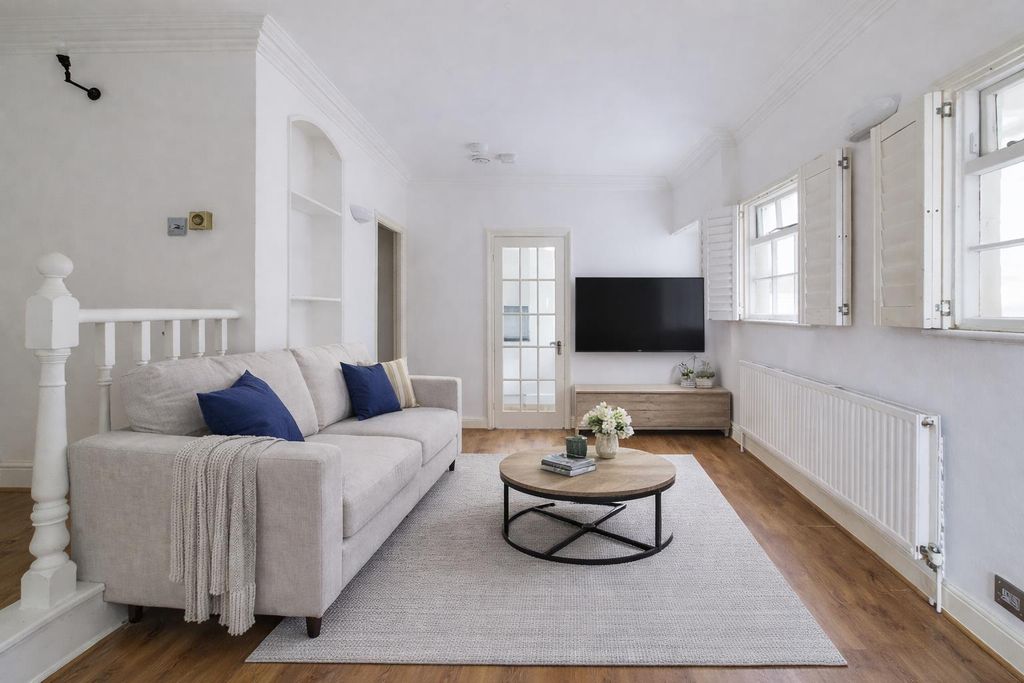 Property photo 1 of 7 Bright And Inviting Living Room Design.Png