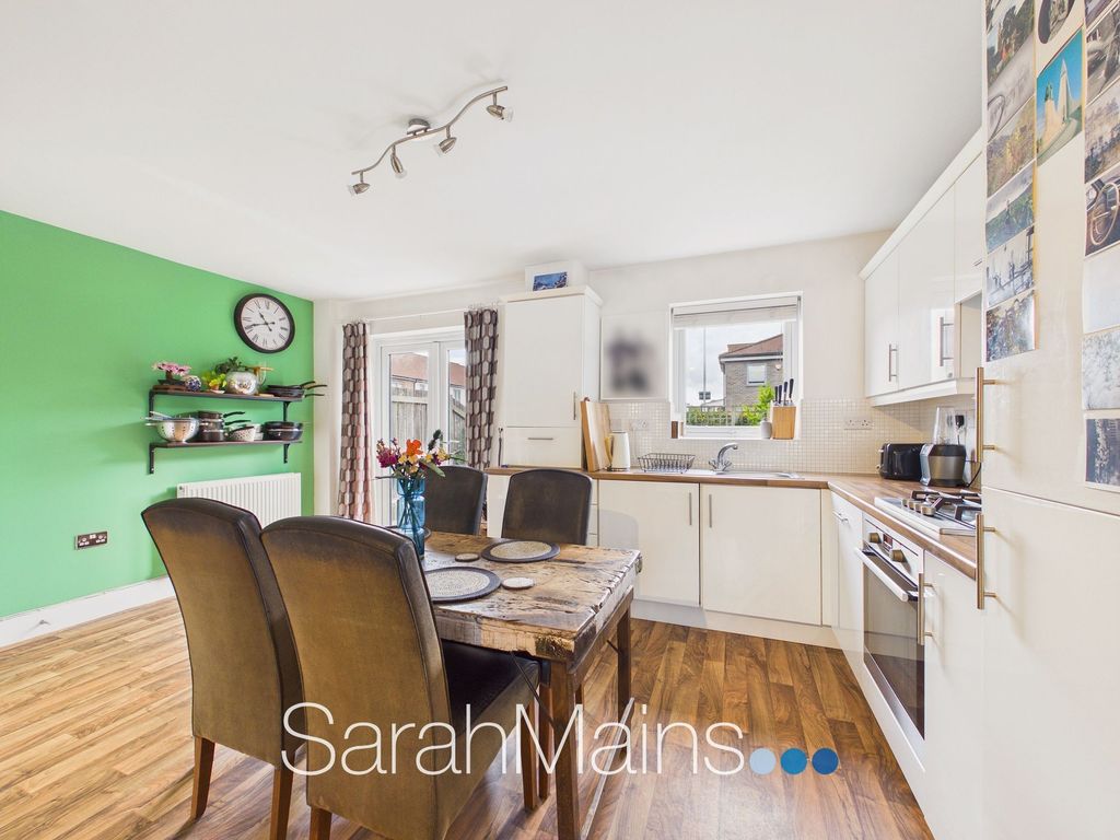 Property photo 2 of 12 Dining Kitchen