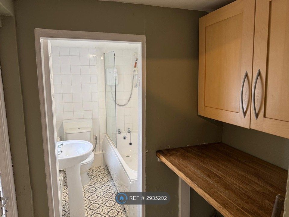 Property photo 3 of 7 Bathroom And Utility Area