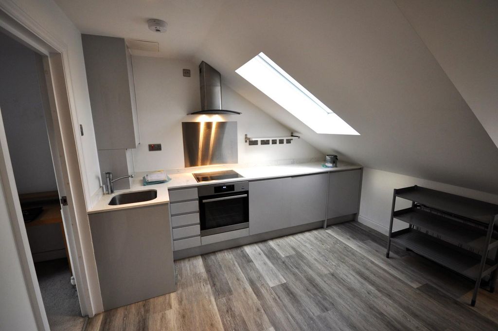 Property photo 3 of 8 Kitchen Area