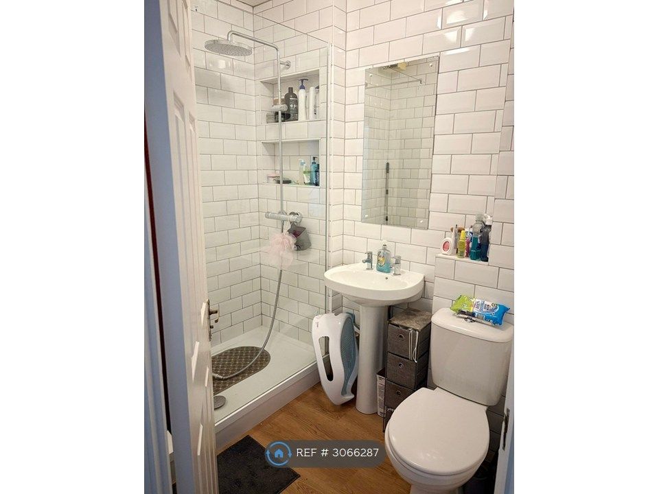 Property photo 2 of 7 Bathroom With Walk-In Shower