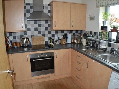 Property photo 3 of 11 Kitchen