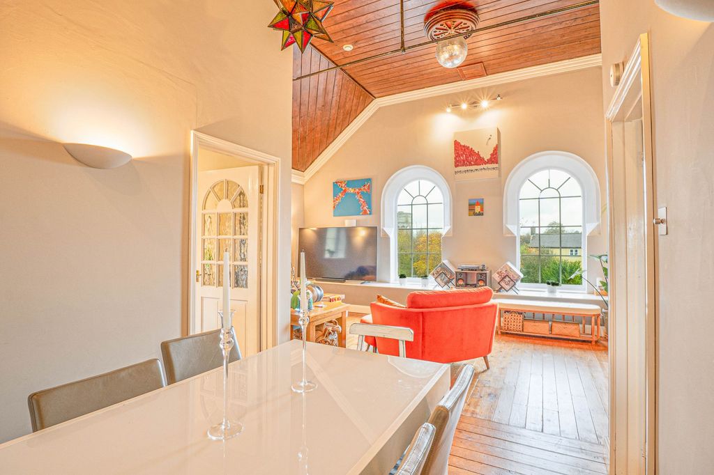 Property photo 3 of 17 Dining/Lounge Area