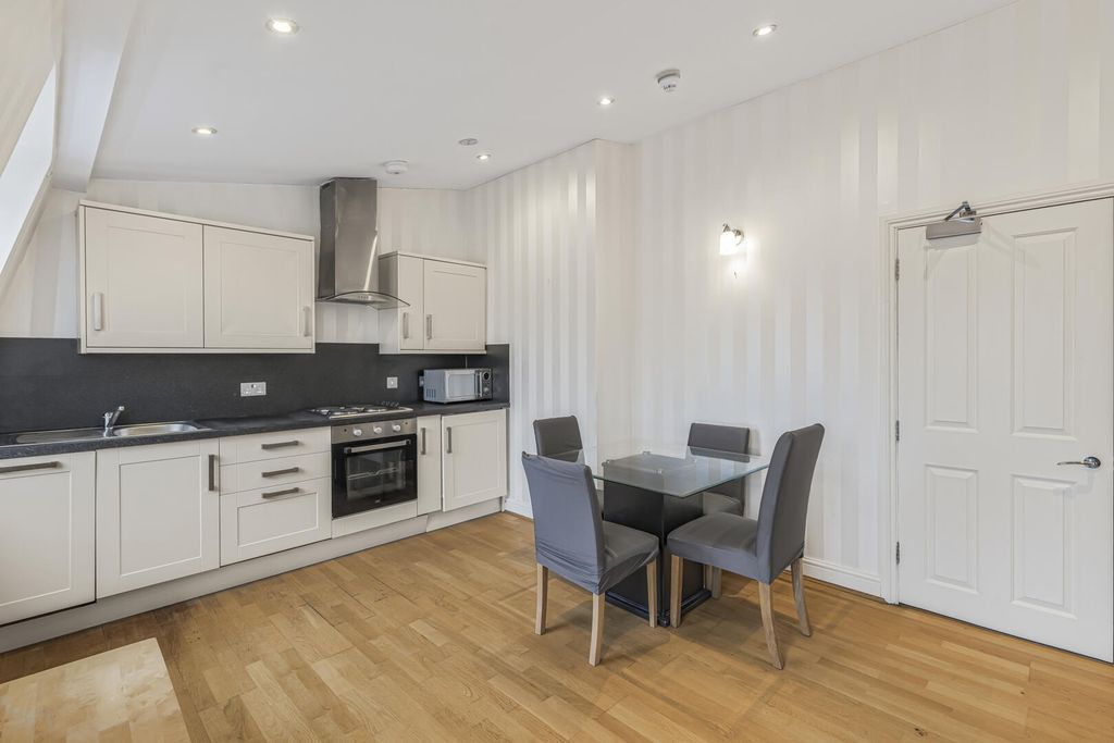 Property photo 3 of 13 Kitchen