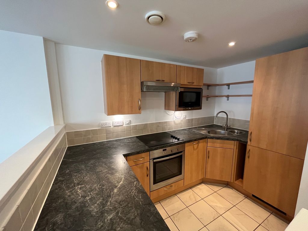 Property photo 3 of 9 Kitchen