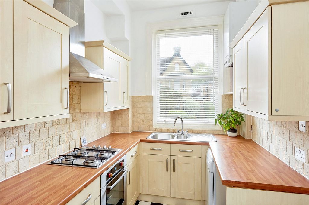 Property photo 3 of 7 Kitchen