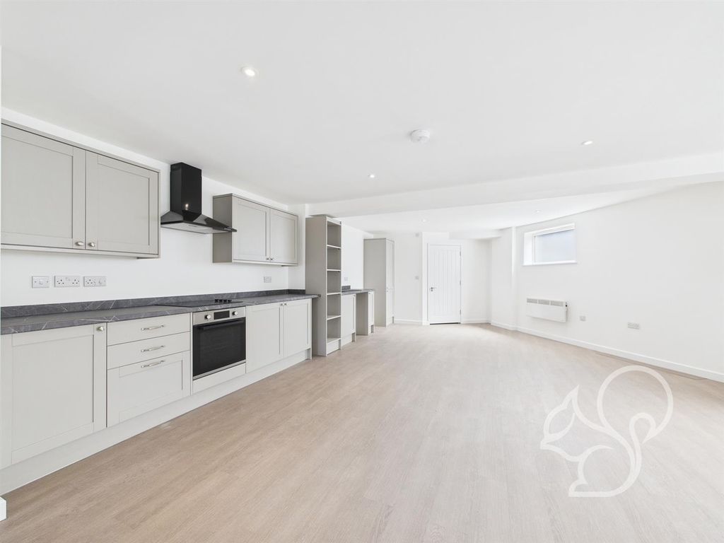 Property photo 2 of 12 Kitchen / Living Area