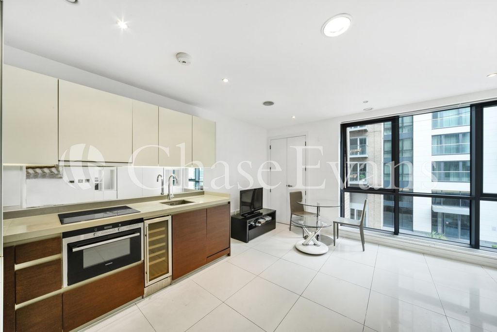 Property photo 1 of 9 Living Area